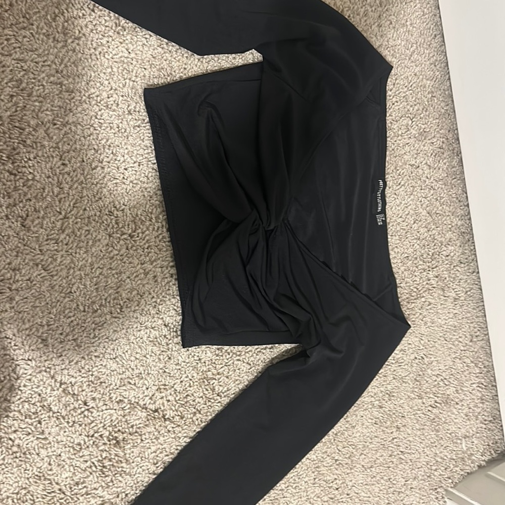 Pretty Little Thing Ruched cropped black long sleeve top.